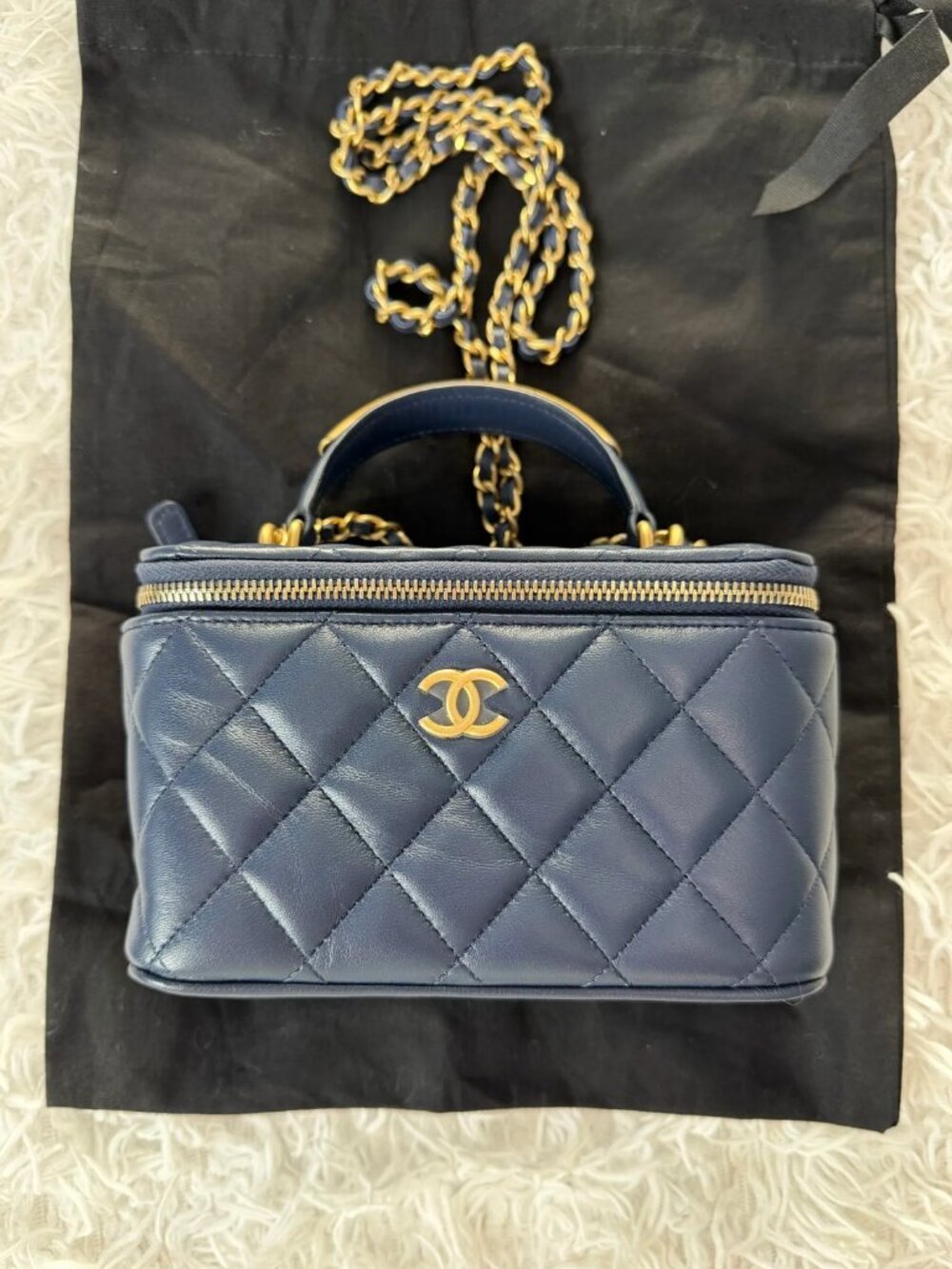 CHANEL Lambskin Quilted Metal Small Top Handle Vanity Case With Chain in Navy Bl